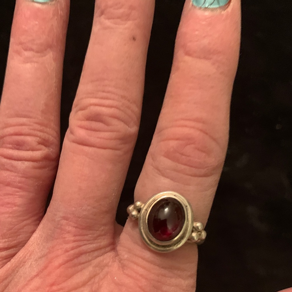 SS ring with dark purple stone